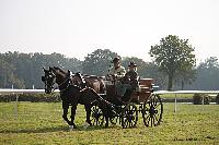 Photo n 51058&#10;La tradition aux courses du Pin au Haras. 2021 &#10;Philippe LAMERANT avec un Demi-tonneau wagonnette attel  un Oldenburg
Photo Nadine TOUDIC&#10;Affiche 8 fois&#10;Ajoute le 13/10/2021 11:47:47 par Nadinetoudic&#10;&#10;--> Cliquer pour agrandir <--
